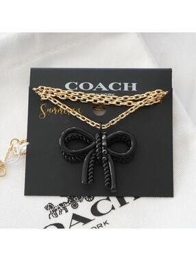 Coach Black Pave Bow Pendant Necklace